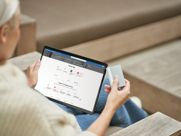 Woman reading a tablet screen